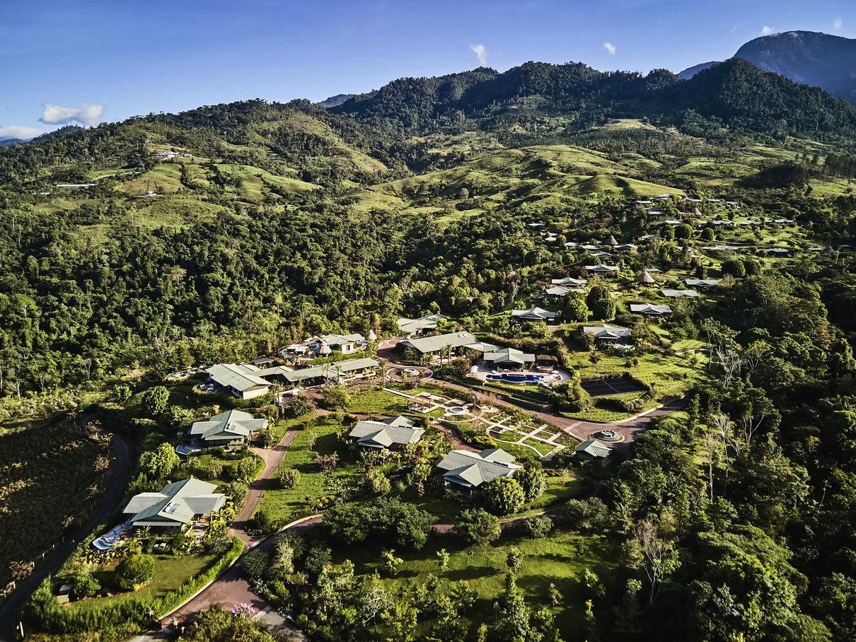 Hacienda AltaGracia - Wide view of structures surrounded by beautiful greenery and blue skies